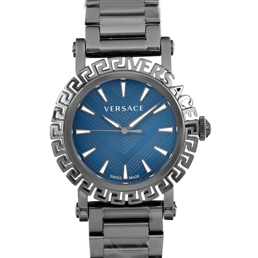 An image of a Wristwatch by Versace. This New With Defects item is designed for Men, featuring a Casual style. It has a Quartz movement and an Analog display with a Blue dial color. The indices include 12-Hour Dial,Stick Indexes. The band is made of Stainless Steel and the case is made of Stainless Steel. The watch has a Round shape with a case size of 39 mm and a case thickness of 9 mm.