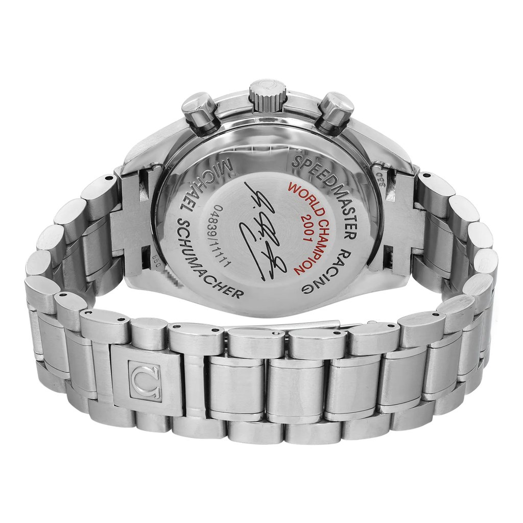 An image of a pre-owned OMEGA men's wristwatch viewed from the back showing the screwback caseback with engraving. Positioned at a straight angle, the watch's stainless steel round case and band are visible, with a single fold-over clasp with push button partially closed, positioned on the lower edge of the frame. The distance is close enough to clearly display the watch's details and texture.