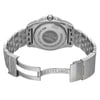 An image of an unworn Breitling women's wristwatch, viewed from the back. The round stainless steel caseback features engraved text and the brand's logo, and it is attached to a stainless steel band with a fold-over clasp open to reveal the flip lock safety mechanism. The watch is positioned at a slight angle to the camera, providing a clear view of the screwback case and the interior side of the clasp, which also displays the Breitling name. The watch appears to be at a close distance, allowing for detailed inspection of its features. The watch show minor blemishes due to store handling.