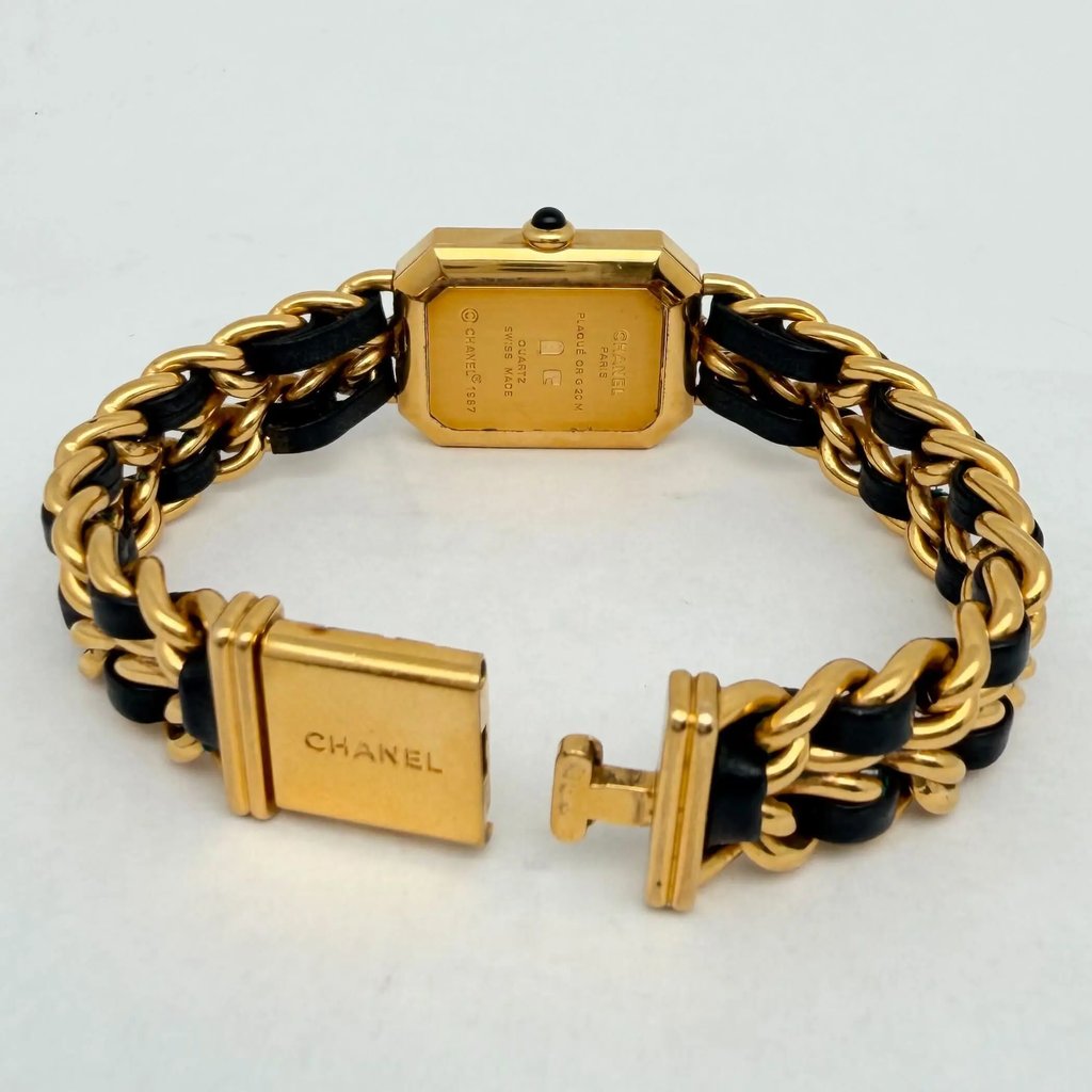 Back View Of Solid Back Case And Open Gold Plated,Leather Band Of Chanel H0001 Watch Pre Owned Condition