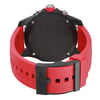 An image of a Breitling men's wristwatch, showcasing the back view with a closed clasp. The watch, portrayed as a display model, has a black Breitlight case with a caseback and a round shape. Attached is a red rubber band featuring a buckle closure. The photograph is taken from a top-down angle, providing a clear and close-up view of the watch's structure and design details. Can have minor blemishes on the watch during handling and shipping. 