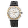 An image of a pre-owned Breitling men's wristwatch in casual style, presented in a full frontal view. The round stainless steel case supports a gold bezel with minor nicks, and a white dial featuring stick indexes and a 12-hour layout with additional sub-dials. The watch is equipped with a black rubber band that shows signs of wear. The watch is photographed from the front at a close distance, ensuring all details are visible.