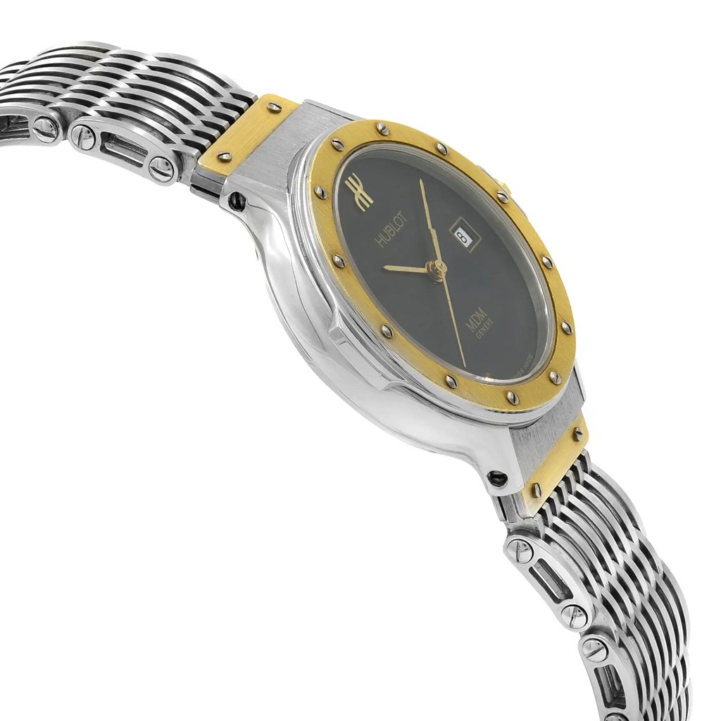 An image of a pre-owned wristwatch captured from a side profile view, opposite the crown. The watch features a two-tone metal design with a gold-toned bezel and a black dial. The angle highlights the sleek bracelet and the pristine condition of the timepiece, showcasing its elegant craftsmanship from a close distance.