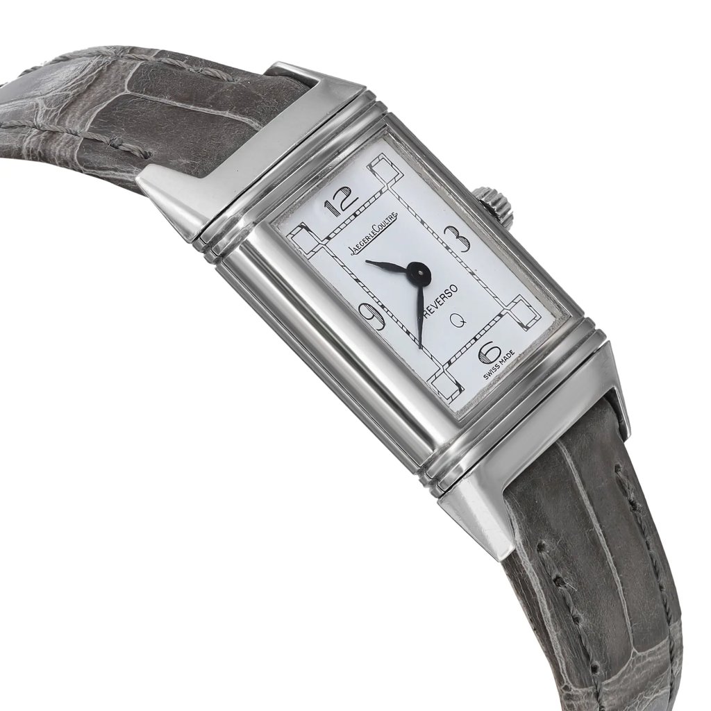 An image of a pre-owned wristwatch shown from the side profile view, opposite the crown. The watch has a rectangular face with a silver casing and a leather strap. The angle highlights the watch's sleek design, capturing it from a close distance to emphasize the details of the face and strap texture.