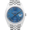 An image of a new Rolex Oyster Perpetual Datejust men's wristwatch, shown in a front close-up shot highlighting the watch face at a direct angle. The watch features a round shape with a blue dial, Roman numeral indices, and a date indicator at the 3 o'clock position. The bezel is white gold, and the stainless steel band is visible in the foreground, suggesting the watch is being viewed from a close distance. The overall condition is excellent, and the style exudes luxury.