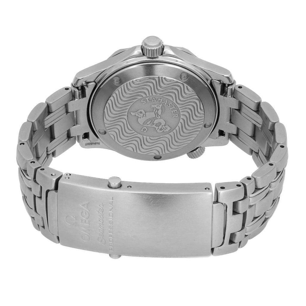 An image of a pre-owned wristwatch viewed from the back, showcasing the closed clasp. The watch is positioned at a slight angle, providing a clear view of the engraved details on the clasp and the watch's back. The image is taken from a close distance, highlighting the intricate design and metal bracelet.