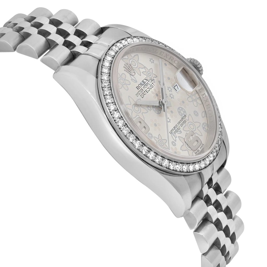 An image of a pre-owned women's Rolex wristwatch taken from a slightly angled side view. The watch features a decorative bezel with sparkling stones, a patterned dial with date indicator, and luminous hands. The watch is positioned prominently in the center, with the bracelet extending to the top left and bottom right corners, showcasing its elegant design.