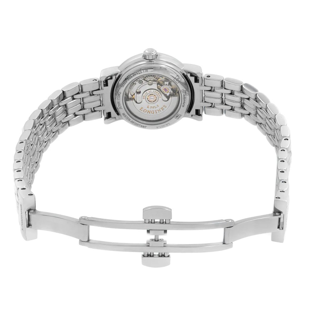 An image of a wristwatch taken from the back view, showcasing its open clasp. The angle is directly from behind, capturing the intricate detailing of the watch's mechanism through the transparent case back. The metal bracelet is fully extended, and the photo is taken at a medium distance to highlight the craftsmanship of the watch. The watch is a display model.