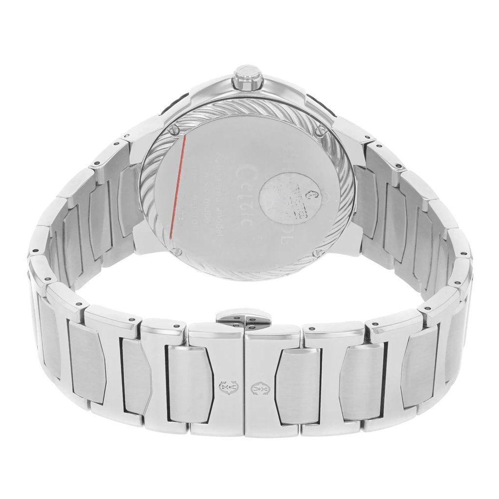 An image of a wristwatch taken from the back view, showcasing the closed clasp. The watch is positioned upright with a slight angle, highlighting the metal links of the bracelet. The image is taken at a close distance, emphasizing the brushed silver finish and the inscriptions on the case back. The watch is a display model, indicating it is in pristine condition.