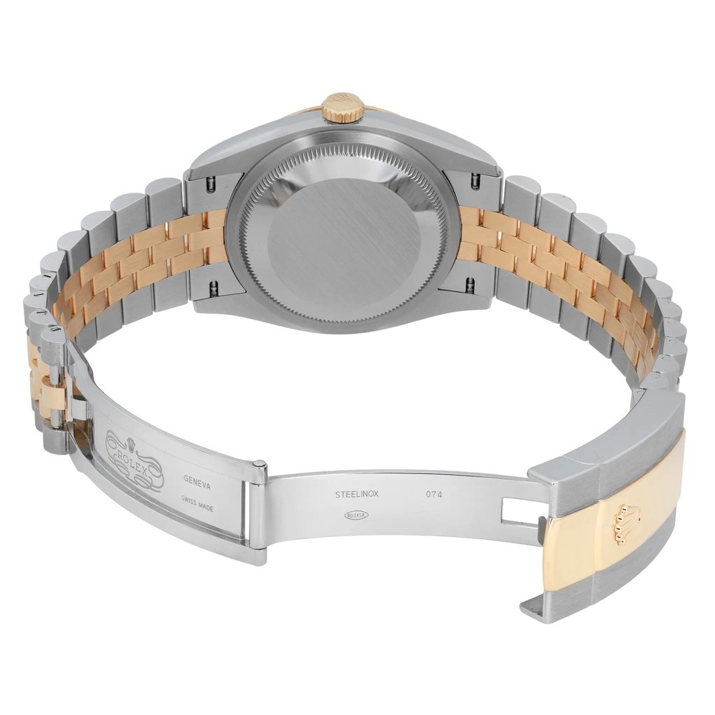 An image of a pre-owned men's Rolex wristwatch taken from a rear angle, showcasing the closed clasp and the back of the watch case. The watch features a two-tone bracelet in steel and gold, with the clasp slightly open, revealing the engraved branding. The watch is positioned at a moderate distance, focusing on the bracelet and backside details.
