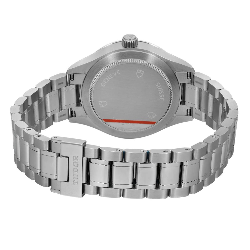 Back View Of Screwback Back Case And Closed Stainless Steel Band Of TUDOR M12300-0002 Watch Unworn Condition