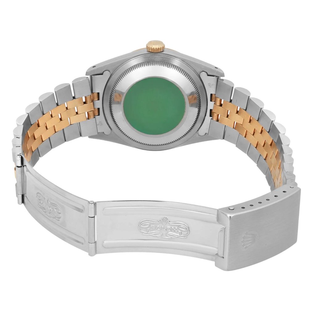 An image of a pre-owned men's Rolex wristwatch viewed from the back at a slightly elevated angle. The watch features a two-tone metal bracelet with stainless steel and gold links. The back of the watch case is visible, displaying a green sticker. The open clasp is shown in the foreground, showcasing the Rolex logo. The image captures the watch from a close distance, highlighting its design and craftsmanship.