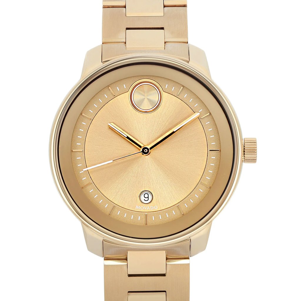 An image of a pre-owned wristwatch taken from a front close-up angle, showcasing the watch's face. The watch features a gold-toned design with sleek hour and minute hands, a small circular date window at the 6 o'clock position, and a minimalist, elegant dial. The watch is positioned centrally in the frame, highlighting its polished, sophisticated appearance.