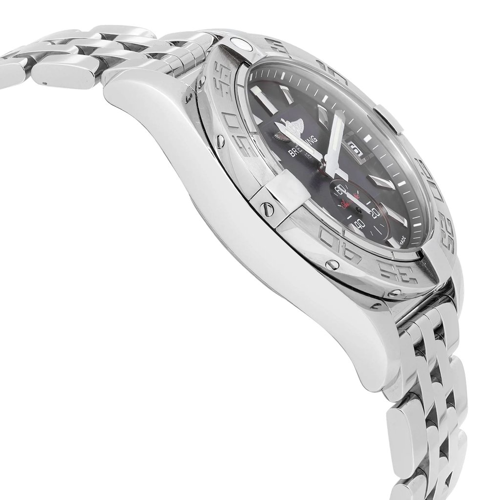 An image of a side profile view of a Breitling unisex adult wristwatch, showing the side opposite the crown. The luxury timepiece, positioned at a slight angle, features a round stainless steel case with a gray bezel and a black dial. The stainless steel band is visible, curving away from the watch face, suggesting depth and giving a sense of the watch's thickness.  The watch is a display model and it may show minor blemishes due to store handling.