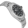 An image of a men's luxury Rolex wristwatch in excellent condition, viewed from the side profile opposite the crown. The watch features a black dial and gray bezel with luminous hands. It has a round shape with a stainless steel case and band, showcasing its elegant design.