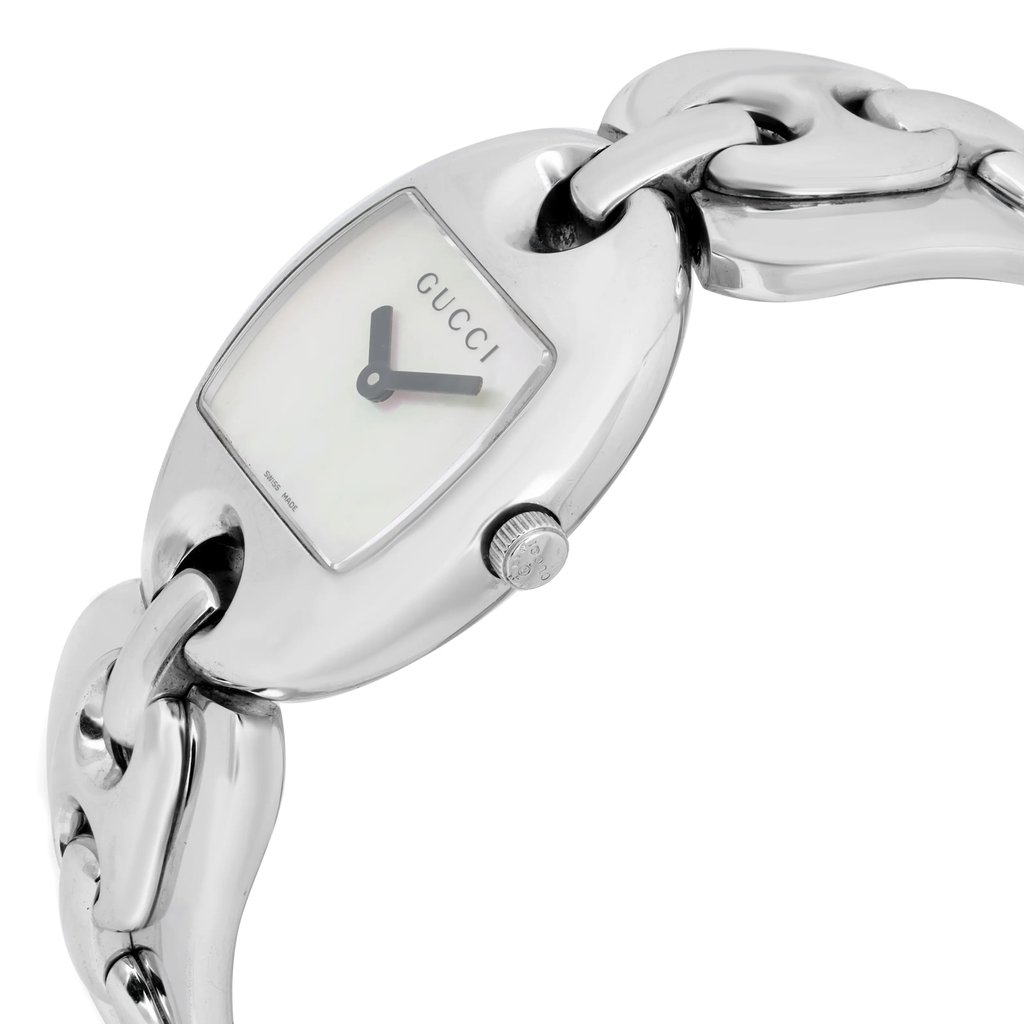 An image of a pre-owned women's Gucci wristwatch, captured at a close-up angle. The watch features a sleek, polished metal chain-link bracelet and an oval-shaped case. The dial is minimalistic with black hands and the Gucci logo at the top. The side view highlights the watch's crown and the smooth links of the bracelet.