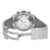 An image of a pre-owned Breitling men's wristwatch, viewed from the back with the clasp open. The stainless steel caseback, which is a screwback type, is in focus, showing text and the Breitling logo. The round watch is positioned at a slight angle, with the band partially wrapped around the case, displaying the mesh texture of the stainless steel band. The fold-over clasp with flip lock safety is visible on the right side of the image, with the Breitling name engraved on it. The watch occupies the central area of the image with a close-up view highlighting the details of the caseback and clasp mechanism.