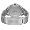 An image of an unworn TAG Heuer men's wristwatch viewed from the back. The screwback case is made of stainless steel and features an engraved star pattern. The round watch case is connected to a stainless steel band that utilizes a fold-over clasp with double push buttons, which is shown in the closed position. A protective sticker is visible on the clasp. The watch is positioned at a slight angle, with the back facing upwards and the band partially visible, The image is shot at a close distance, providing a clear view of the watch's details.