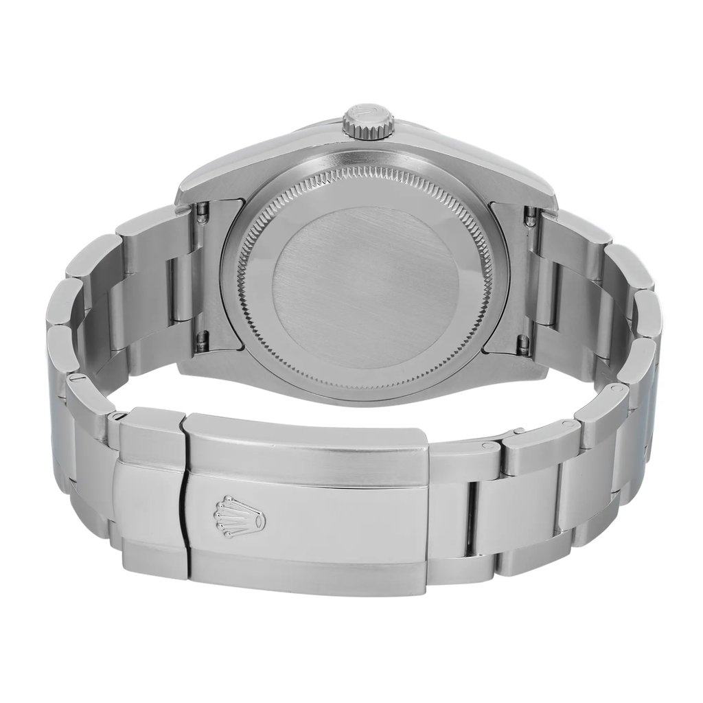 An image of a pre-owned wristwatch taken from the back view. The focus is on the closed clasp, displaying the brand logo. The watch features a stainless steel bracelet, with the angle showcasing the back of the case and the clasp prominently. The photograph is taken at a close distance, highlighting the brushed metal texture and design details.