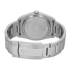 An image of a pre-owned wristwatch taken from the back view. The focus is on the closed clasp, displaying the brand logo. The watch features a stainless steel bracelet, with the angle showcasing the back of the case and the clasp prominently. The photograph is taken at a close distance, highlighting the brushed metal texture and design details.