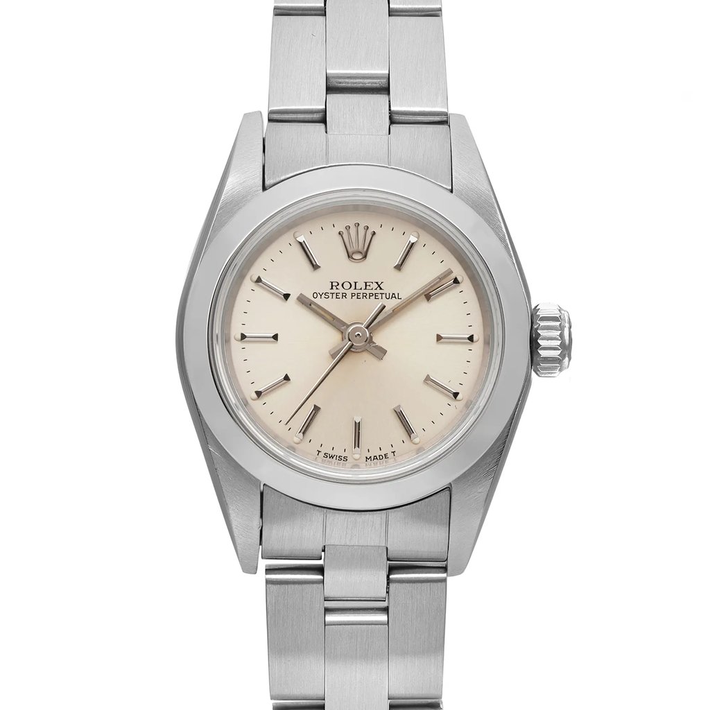 An image of a Wristwatch by Rolex. This Pre Owned item is designed for Women, featuring a Classic,Dress/Formal style. It has a Mechanical (Automatic) movement and an Analog display with a Silver dial color. The indices include 12-Hour Dial,Stick Indexes. The band is made of Stainless Steel and the case is made of Stainless Steel. The watch has a Round shape with a case size of 26 mm and a case thickness of 9.5 mm.