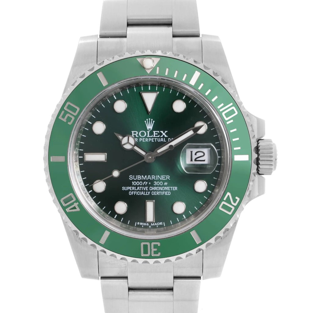 An image of a pre-owned wristwatch, captured in a front close-up shot focusing on the watch face. The watch features a green bezel and dial, with a stainless steel band, displaying the time and a date window.