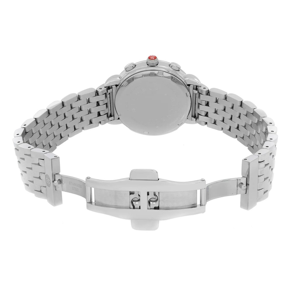 An image of a wristwatch taken from the back view with an open clasp. The watch features a metal link band and the clasp is prominently displayed in the foreground. The angle highlights the intricate detailing of the band and the smooth, circular back of the watch case. The distance is close enough to show the texture and design clearly, suggesting it is a display model in pristine condition.