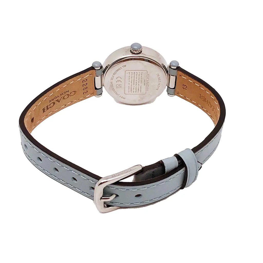 An image of a Wristwatch by Coach. This Display Model item is designed for Women, featuring a Dress/Formal style. It has a Quartz movement and an Analog display with a White dial color. The indices include 12-Hour Dial,Arabic Numerals. The band is made of Leather and the case is made of Stainless Steel. The watch has a Round shape with a case size of 26 mm and a case thickness of 8 mm.