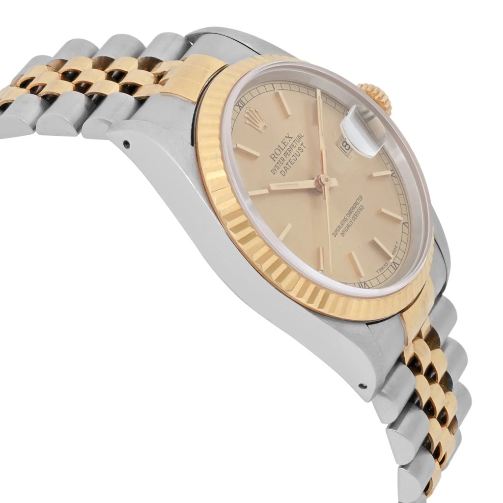 An image of a pre-owned men's Rolex wristwatch taken from a slightly elevated angle, showcasing the side and partial front view. The watch features a two-tone metal bracelet with gold and stainless steel links. The dial is beige with a date indicator and luminous hands, encased in a gold bezel. The focus is on the watch face and band, with a medium distance capturing the details clearly.