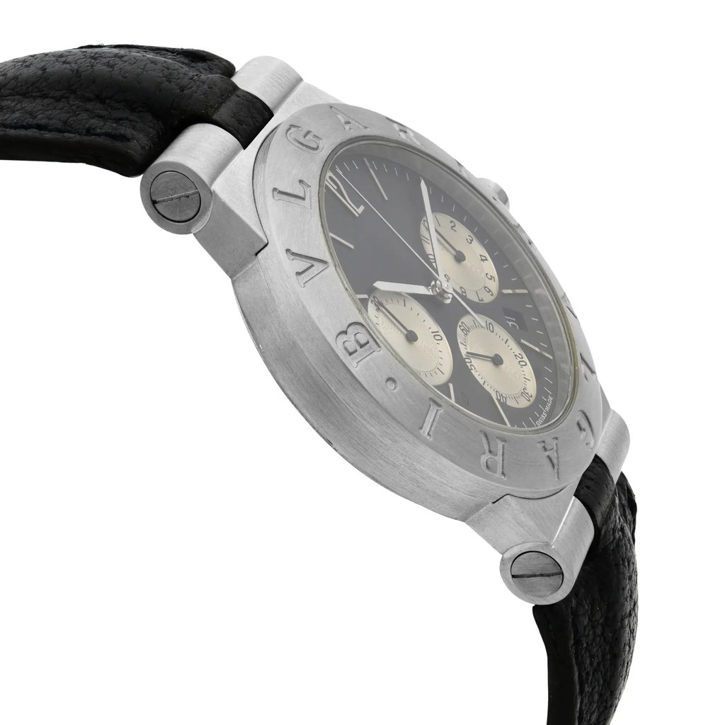 An image of a pre-owned wristwatch shown from a side profile view, opposite the crown. The watch features a black leather strap and a silver-toned case. The bezel is engraved with the brand name, and the dial is visible with three subdials and silver hands. The watch is positioned at a slight angle, capturing the thickness of the case, and is photographed at a close distance to highlight its details.