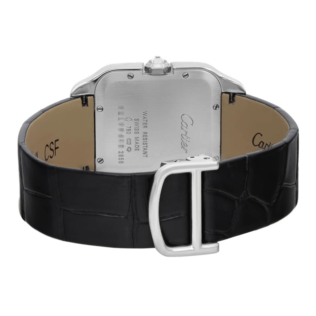 An image of a pre-owned wristwatch from the back view, focusing on the close clasp. The watch features a black leather strap with a textured pattern and a metallic clasp. The watch case is silver-toned with engraved details and branding visible. The image is taken from a close angle, highlighting the clasp and back details.