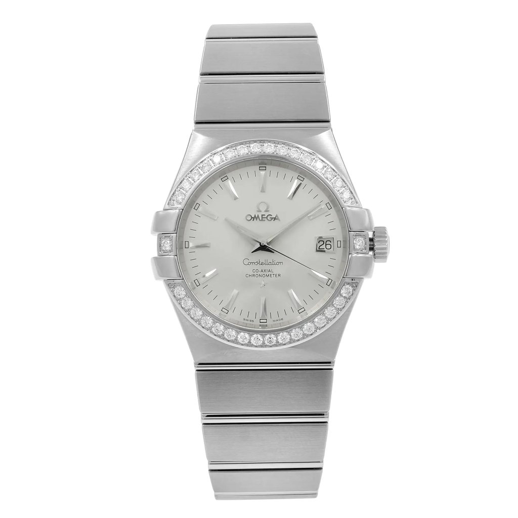 An image of a Wristwatch by OMEGA. This New Wihthout Tags item is designed for Unisex, featuring a Luxury style. It has a Mechanical (Automatic) movement and an Analog display with a Silver dial color. The indices include Non-Numeric Hour Marks,Sticks. The band is made of Stainless Steel and the case is made of Stainless Steel. The watch has a Round shape with a case size of 35 mm and a case thickness of 11 mm.
