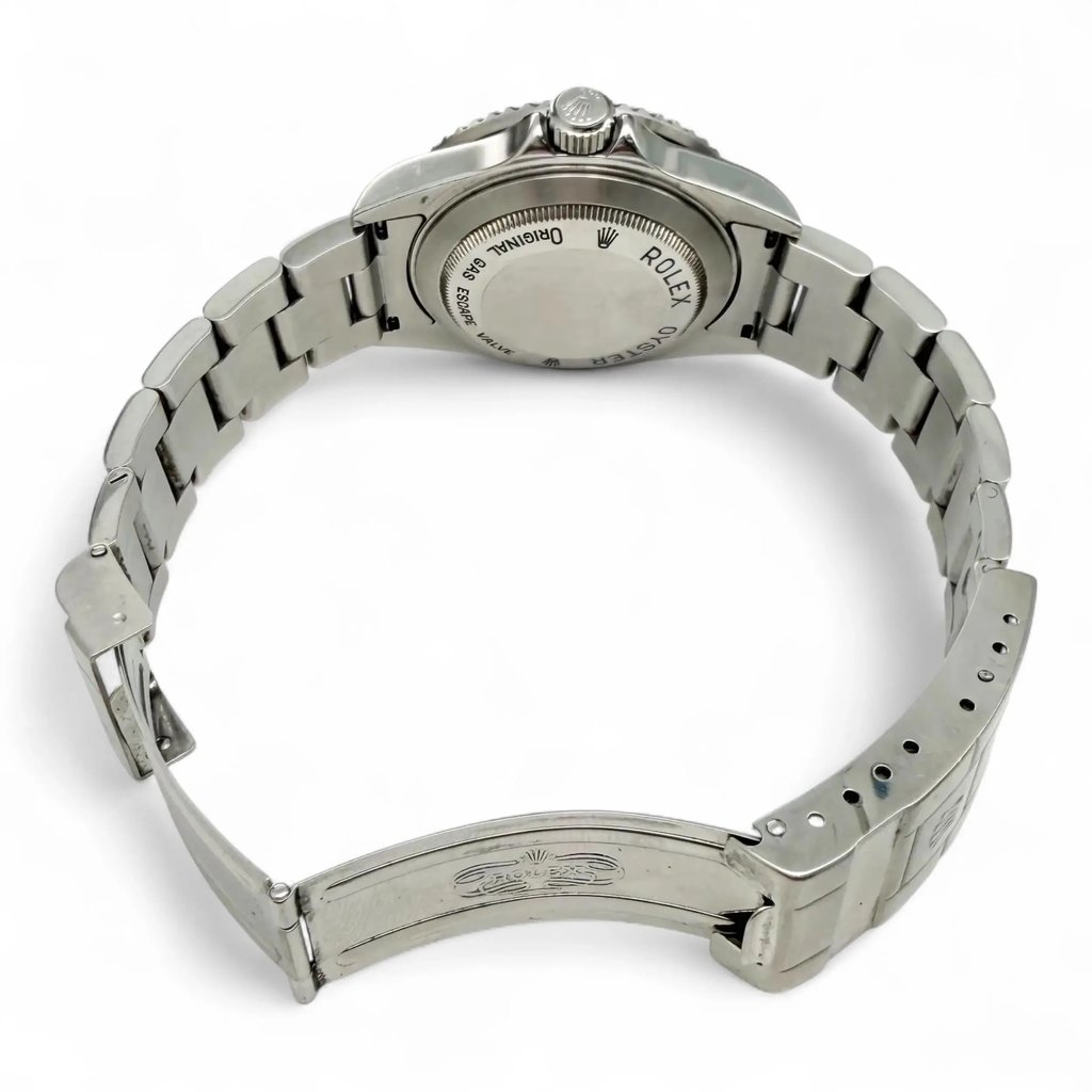 Back View Of Solid Back Case And Open Stainless Steel Band Of Rolex 16600 Watch Pre Owned Condition