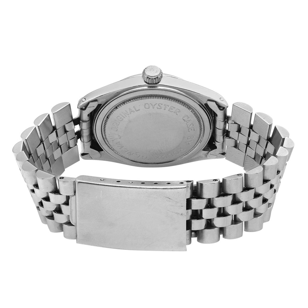 An image of a pre-owned Tudor men's wristwatch, showcasing the back view. The watch is positioned upright with the bracelet partially open, captured from a slightly elevated angle at a medium distance. The focus is on the white gold case back and bracelet, highlighting the engraved details on the case back and the polished links of the band.