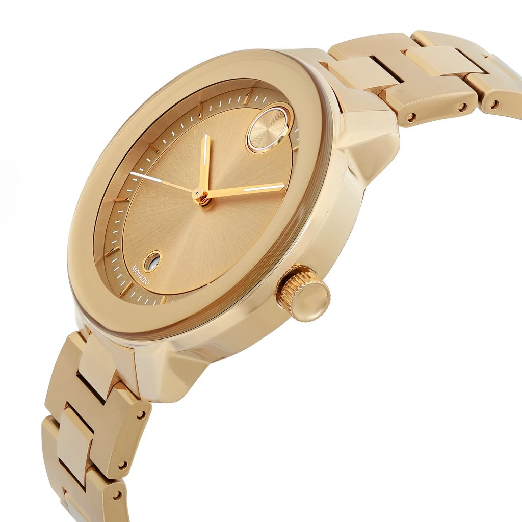 An image of a pre-owned wristwatch displayed in a side profile view, showcasing the crown prominently. The watch features a gold-toned case and matching bracelet, with the face angled slightly upward to reveal its minimalist design and sleek, polished finish. The image is taken from a moderate distance, highlighting the watch's elegant and sophisticated appearance.