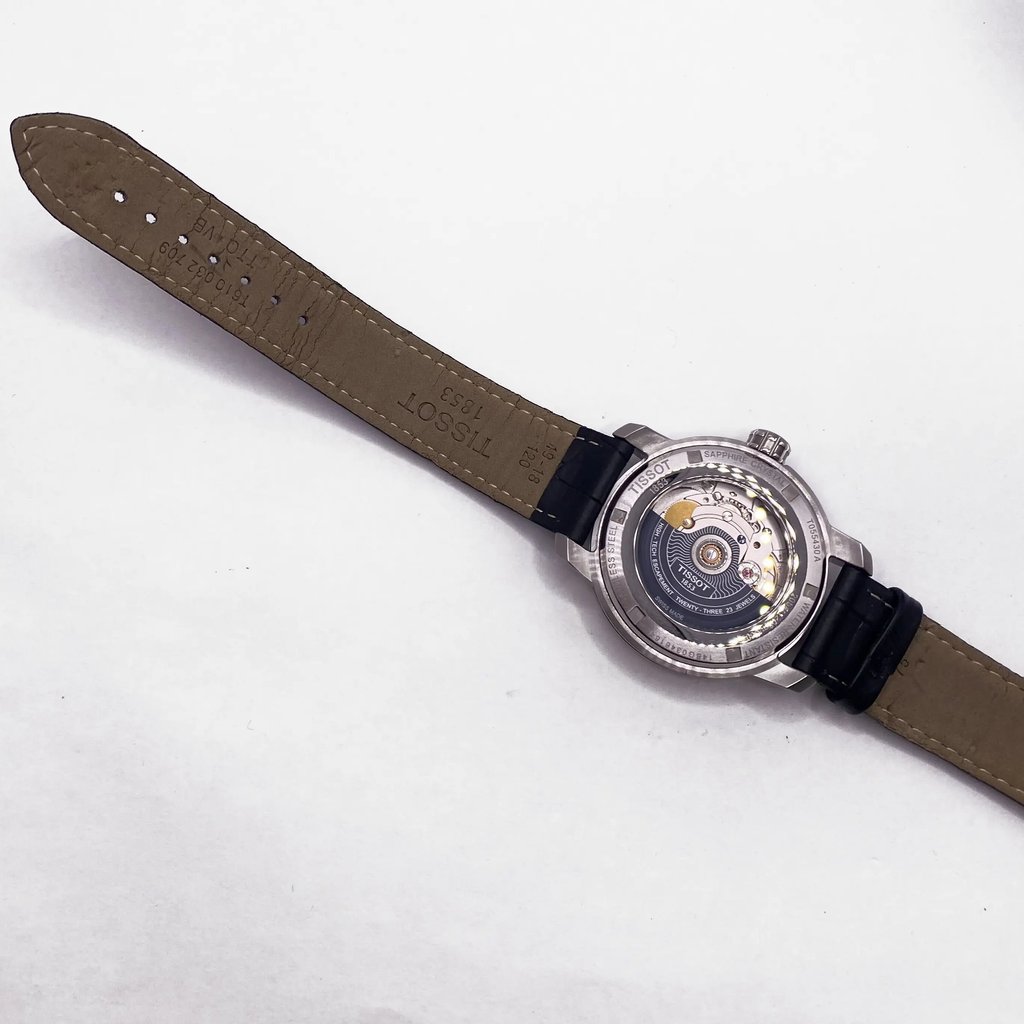 Back View Of Exhibition Back Case And Closed Leather Band Of Tissot T055.430.16.057.00 Watch Pre Owned Condition
