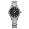 An image of a women's TUDOR Style 34mm wristwatch in an unworn condition, captured from a front-facing angle at a close distance. The watch features a sleek stainless steel bracelet and a black dial with a date indicator at the 3 o'clock position. The watch face includes the brand's logo and "ROTOR SELF-WINDING" text. The watch comes with original box and papers.