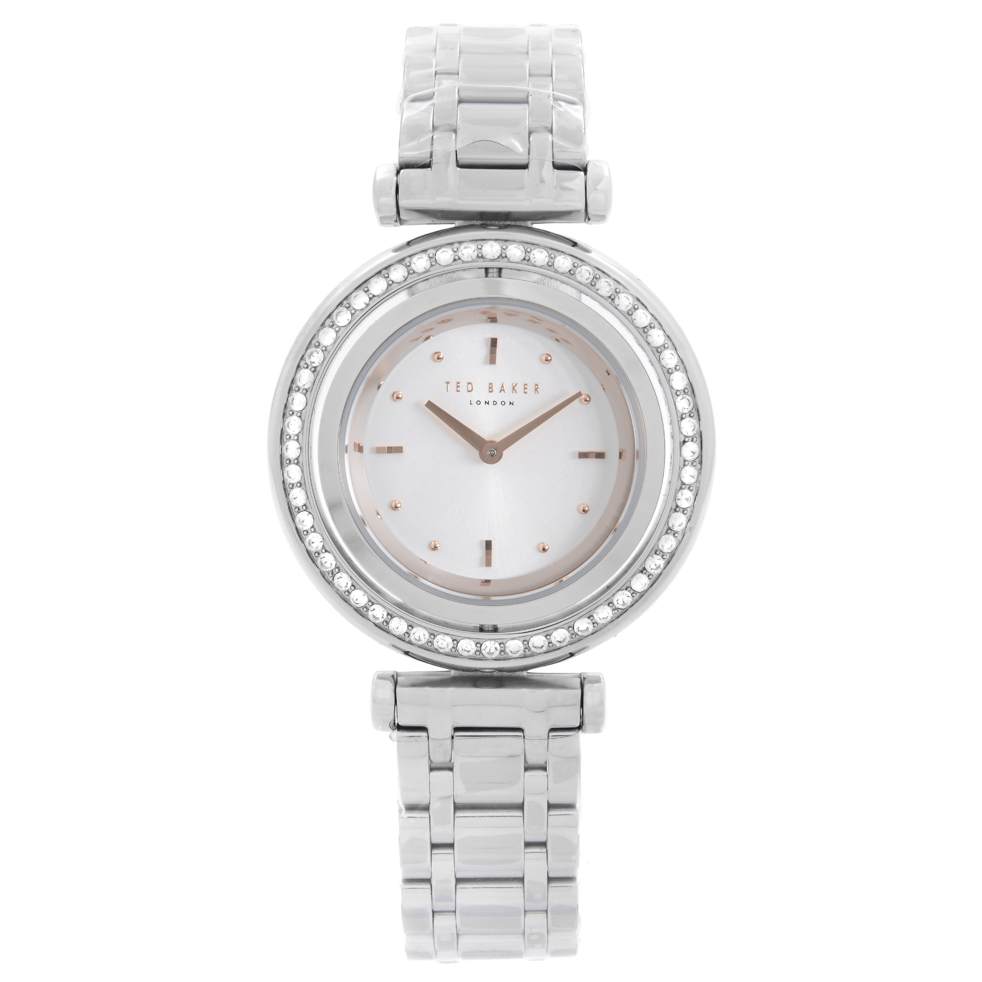 An image of a Wristwatch by Ted Baker. This Unworn item is designed for Women, featuring a Dress/Formal style. It has a Quartz movement and an Analog display with a Silver dial color. The indices include Stick Indexes. The band is made of Stainless Steel and the case is made of Stainless Steel. The watch has a Round shape with a case size of 34 mm and a case thickness of 8 mm.