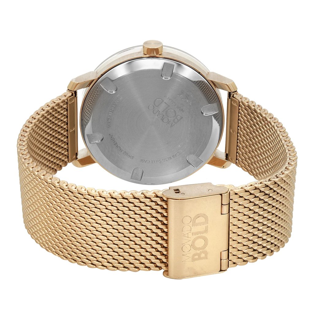 An image of a pre-owned wristwatch showing the back view. The watch features a round stainless steel case and a gold-toned mesh band, with the clasp prominently displayed in the foreground. The angle is slightly elevated, capturing the clasp and the watch case in close detail.