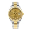 An image of a Wristwatch by Rolex. This Pre Owned item is designed for Men, featuring a Luxury style. It has a Mechanical (Automatic) movement and an Analog display with a Gold dial color. The indices include Stick Indexes. The band is made of Stainless Steel,Yellow Gold and the case is made of Stainless Steel. The watch has a Round shape with a case size of 41 mm and a case thickness of 12 mm.
