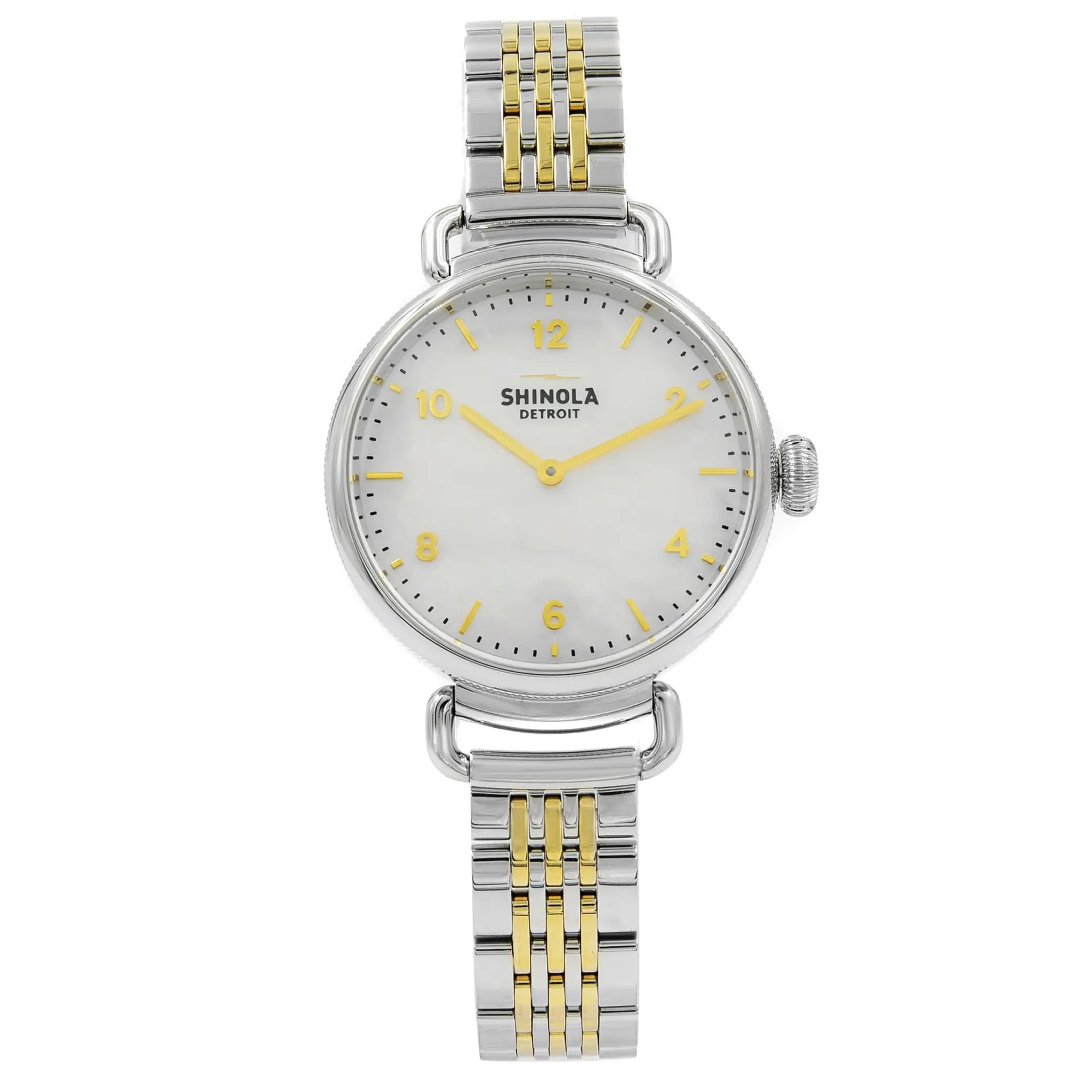 An image of a Wristwatch by Shinola. This Unworn item is designed for Women, featuring a Dress/Formal,Luxury style. It has a Quartz movement and an Analog display with a Mother of Pearl dial color. The indices include 12-Hour Dial,Arabic Numerals. The band is made of Stainless & Plated Metal and the case is made of Stainless Steel. The watch has a Round shape with a case size of 32 mm and a case thickness of 10 mm.