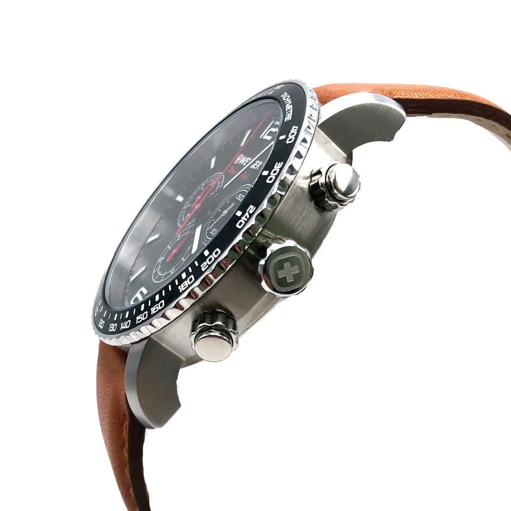 An image of a Wristwatch by Wenger. This New With Defects item is designed for Men, featuring a Casual style. It has a Quartz movement and an Analog display with a Black dial color. The indices include 12-Hour Dial,Arabic Numerals,Seconds Hand,Stick Indexes. The band is made of Leather and the case is made of Stainless Steel. The watch has a Round shape with a case size of 45 mm and a case thickness of 12 mm.