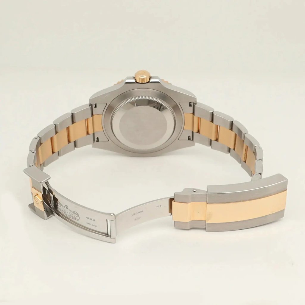 Back View Of Solid Back Case And Open Stainless Steel Band Of Rolex 126613LB Watch Pre Owned Condition