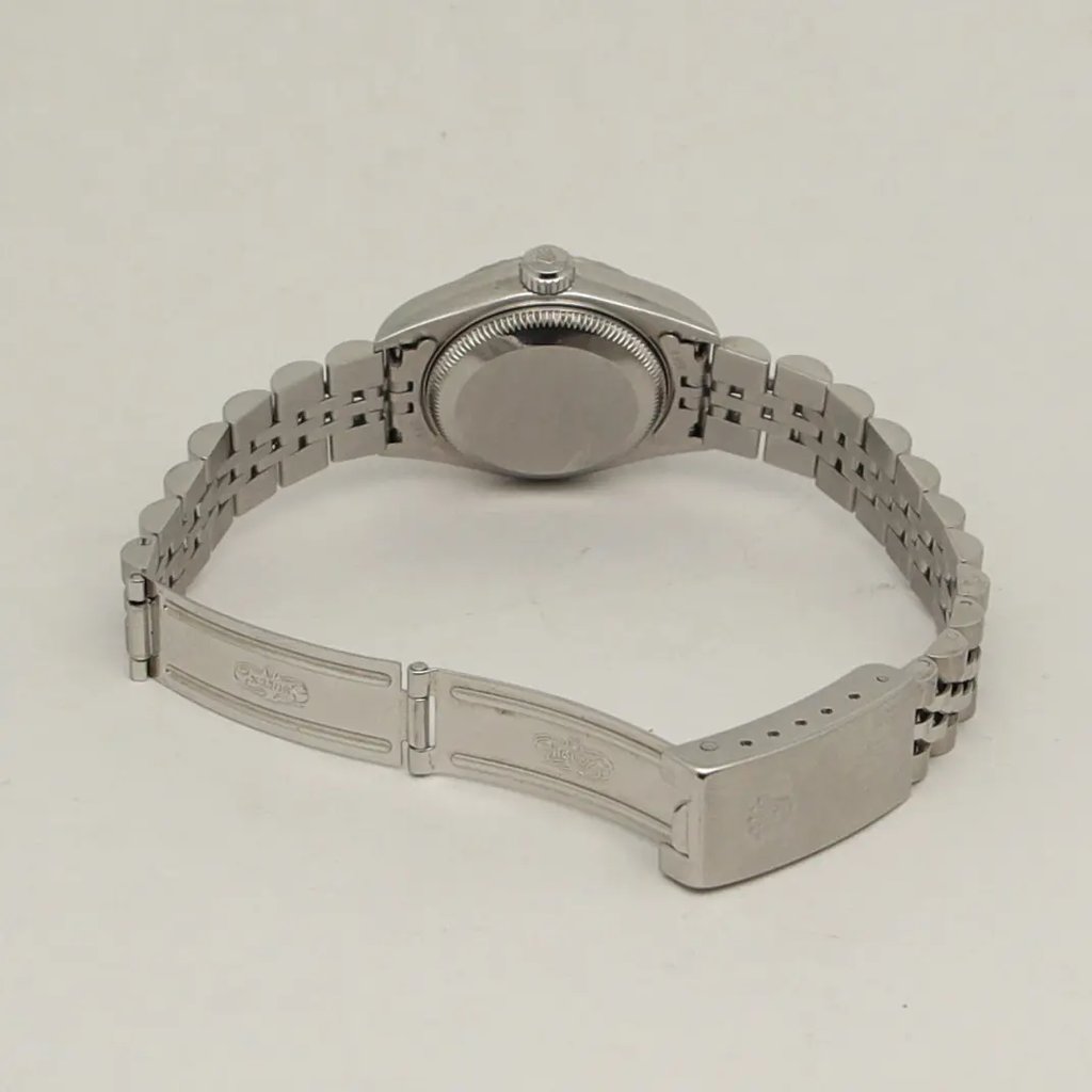 Back View Of Screwback Back Case And Open Stainless Steel Band Of Rolex 79240 Watch Pre Owned Condition