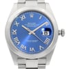 An image of a new wristwatch, taken from a front close-up angle, showcasing the watch face prominently. The dial is a rich blue with silver Roman numerals and a date window at the 3 o'clock position. The watch features a stainless steel case and a polished bezel, with the crown visible on the right side.