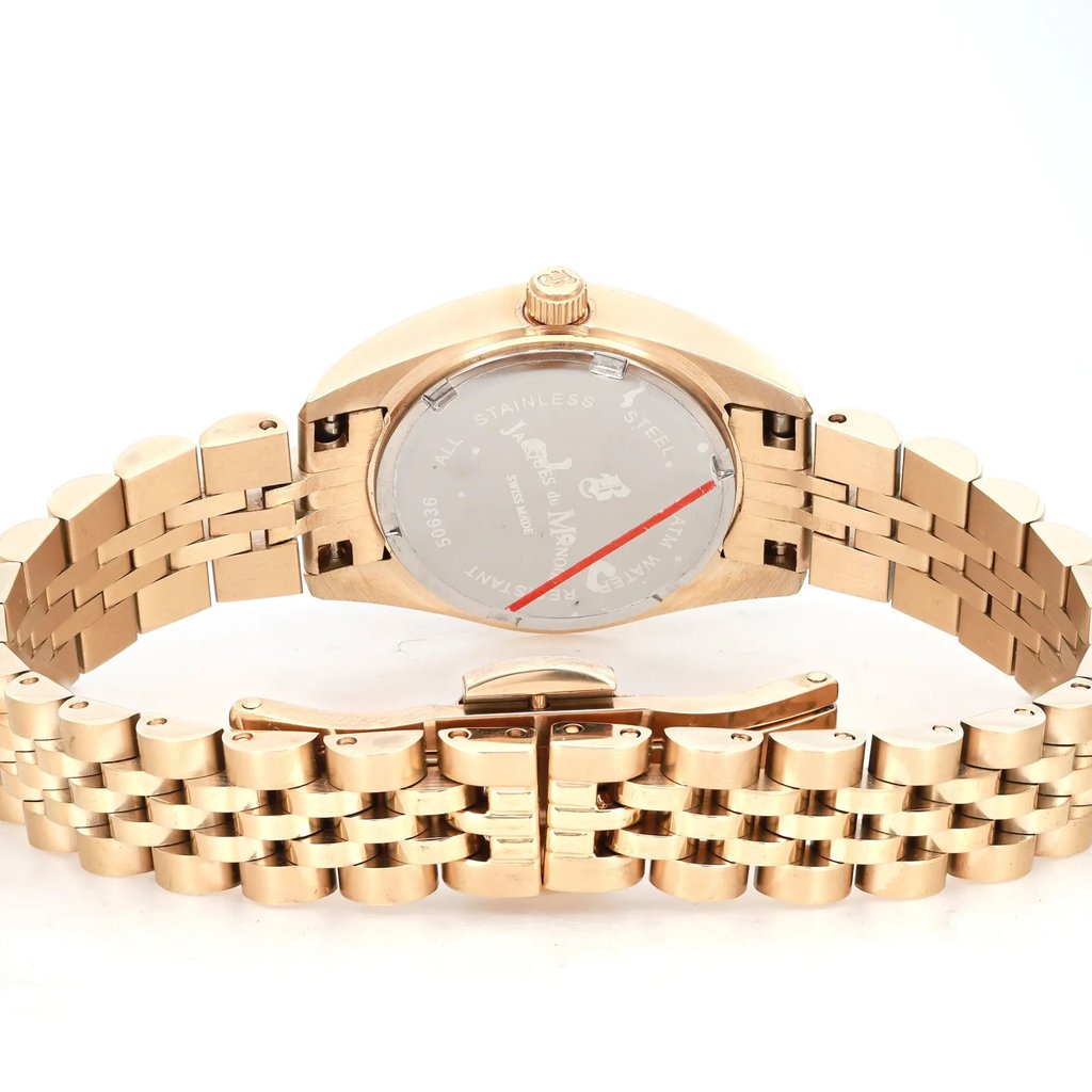 An image of a Wristwatch by Jacques du Manoir. This Display Model item is designed for Women, featuring a Dress/Formal style. It has a Quartz movement and an Analog display with a Black dial color. The indices include 12-Hour Dial,Diamond Markers. The band is made of Stainless Steel and the case is made of Stainless Steel. The watch has a Round shape with a case size of 26 mm and a case thickness of 9 mm.