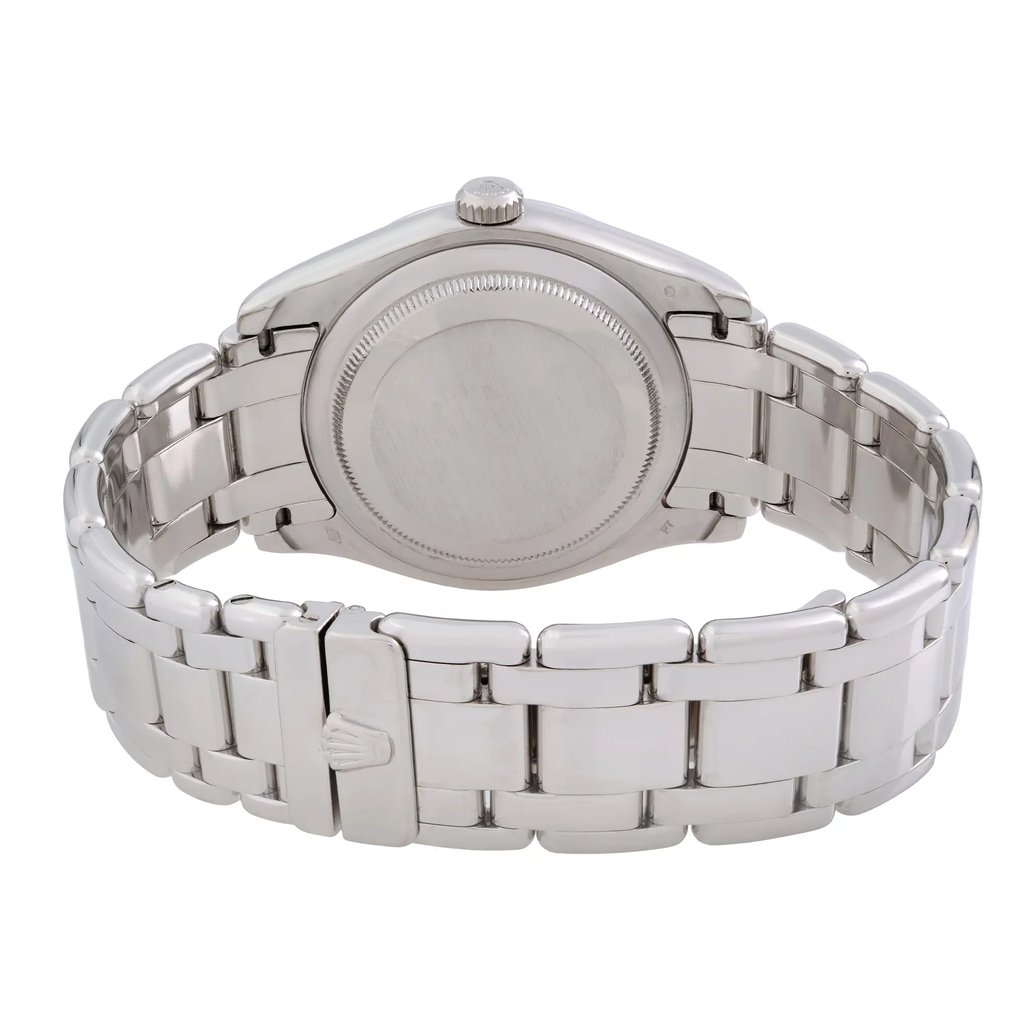 An image of a pre-owned wristwatch taken from the back view, showcasing the closed clasp. The watch features a metal bracelet with a polished finish. The image is captured at a close distance, highlighting the details of the clasp and the smooth, round case back. The watch crown is visible at the top, positioned centrally in the frame.