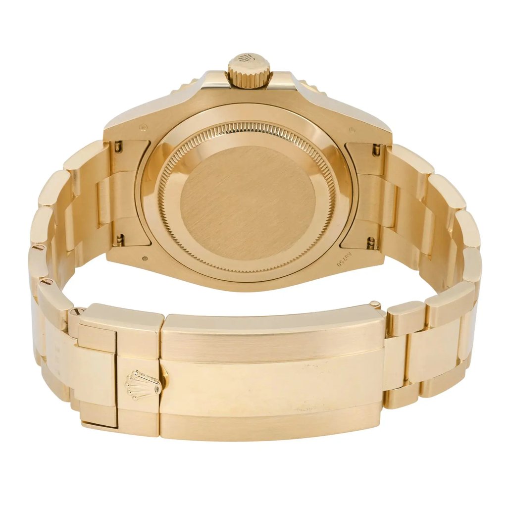 An image of a pre-owned men's Rolex wristwatch viewed from the back. The watch is positioned upright, displaying the gold case and bracelet at a slight angle. The focus is on the case back and bracelet clasp, captured from a close distance.
