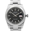 An image of a pre-owned wristwatch taken from a front close-up angle, showcasing the watch face. The watch features a black dial with silver hour markers and hands. A date window is visible on the right side. The stainless steel case and bracelet are prominently displayed, emphasizing the watch's polished finish.