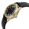 An image of a pre-owned women's Rolex wristwatch. The watch is positioned at a slight angle, viewed from the front and right side, showcasing its gold casing and black leather strap. The close-up perspective highlights the watch's black dial with bold, white numerals and a red second hand. The crown is visible on the right side.